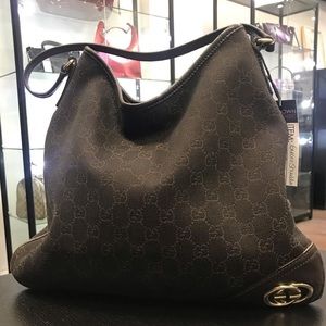 Brown Gucci monogram hobo